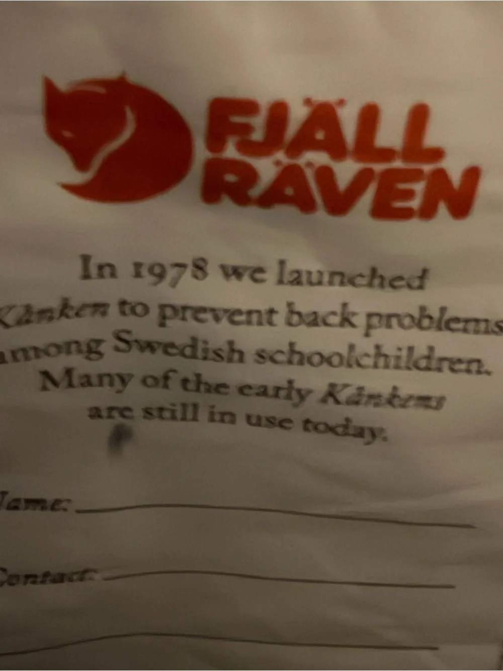Fjallraven Kånken Backpack in Dark Gray with Red Logo